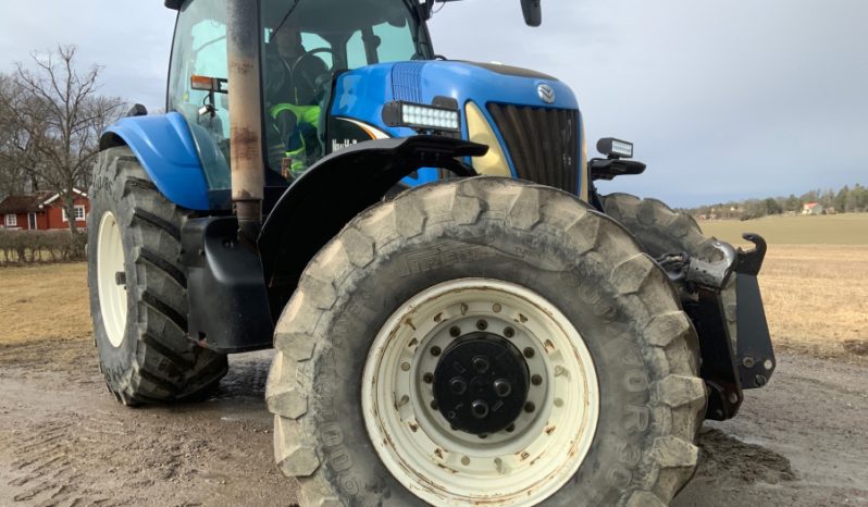 New Holland TG285 pieno